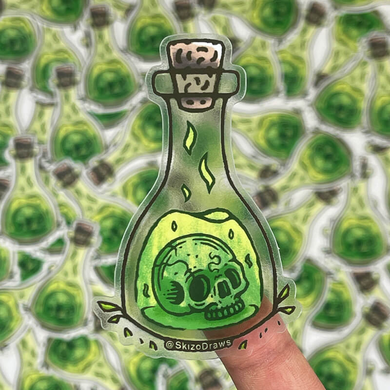 Transparenter Freiform-Sticker mit einem Totenkopf, der in einer Flasche mit grünem Elixier schwebt, vor einem Hintergrund aus Stickern.